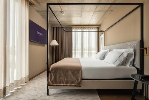Suite Junior con balcón del hotel Exe Essenzia Porto. Foto 4