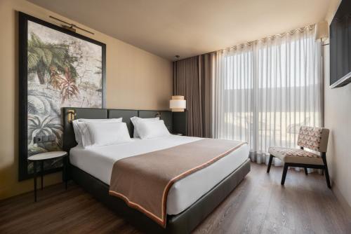 Habitación Doble con balcón - 1 o 2 camas del hotel Exe Essenzia Porto. Foto 10