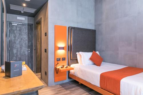 Habitación Individual Estándar del hotel J24 Milano. Foto 3