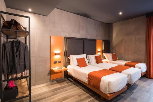 Habitación Triple Estándar del hotel J24 Milano. Foto 4