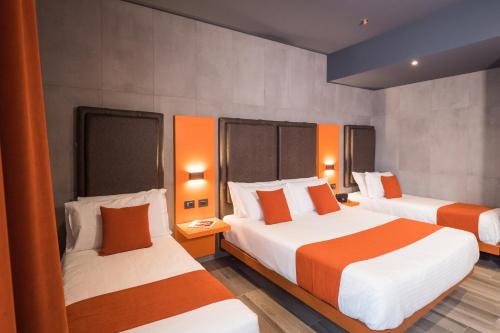 Habitación Cuádruple Estándar del hotel J24 Milano. Foto 4