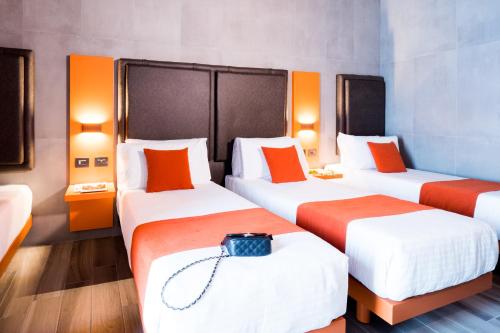 Habitación Cuádruple Estándar del hotel J24 Milano. Foto 5