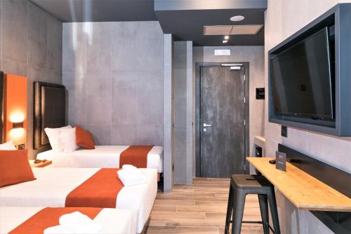 Habitación Cuádruple Estándar del hotel J24 Milano. Foto 6