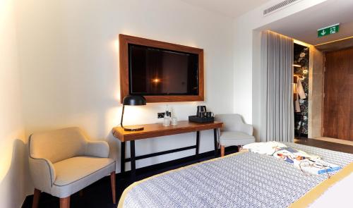 Habitación Doble Deluxe del hotel Pousada Porto - Rua das Flores. Foto 1