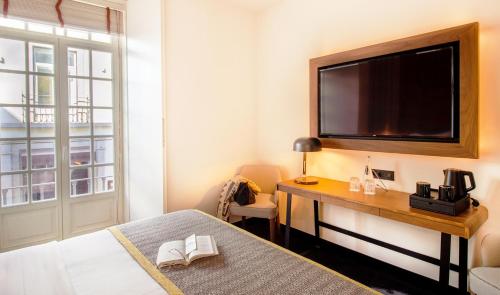 Habitación Doble Deluxe del hotel Pousada Porto - Rua das Flores. Foto 3