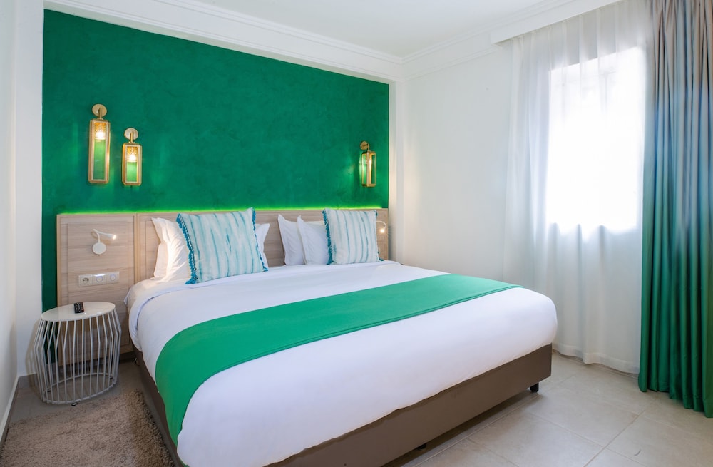 Habitación Familiar con vistas a la ciudad del hotel Sol Oasis Marrakech - All Inclusive. Foto 1