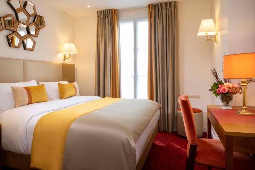 Habitación Doble Clásica del hotel De Suede Saint Germain. Foto 1
