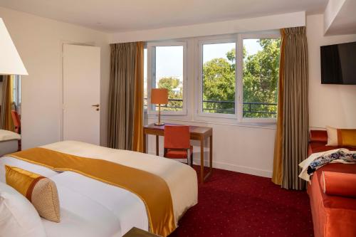 Suite Deluxe con vistas al jardín del hotel De Suede Saint Germain. Foto 4