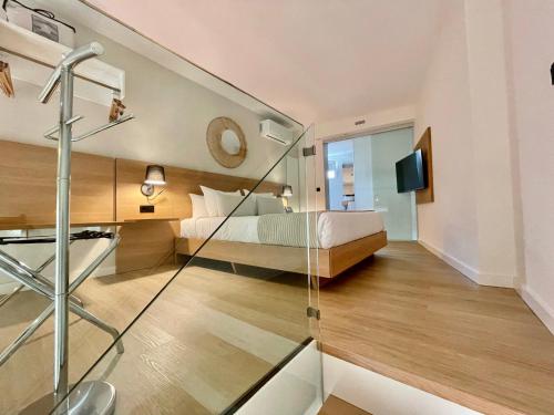 Suite Lujo 1 Cama king Duplex Vista ciudad Confort del hotel Emblemático Hi Suites. Foto 8