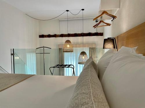 Suite Lujo 1 Cama king Duplex Vista ciudad Confort del hotel Emblemático Hi Suites. Foto 15