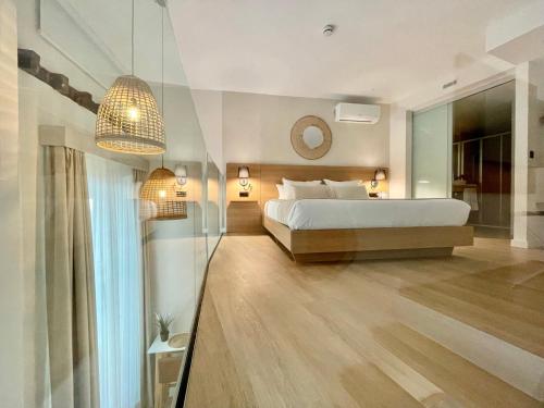 Duplex 2 dormitorios Lujo Balcón o Terraza 1 Cama king Dúplex Sofá Cama incluido del hotel Emblemático Hi Suites. Foto 2