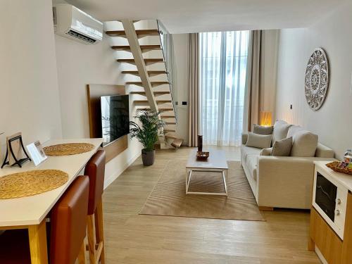 Duplex 2 dormitorios Lujo 1 Cama king Dúplex del hotel Emblemático Hi Suites. Foto 11