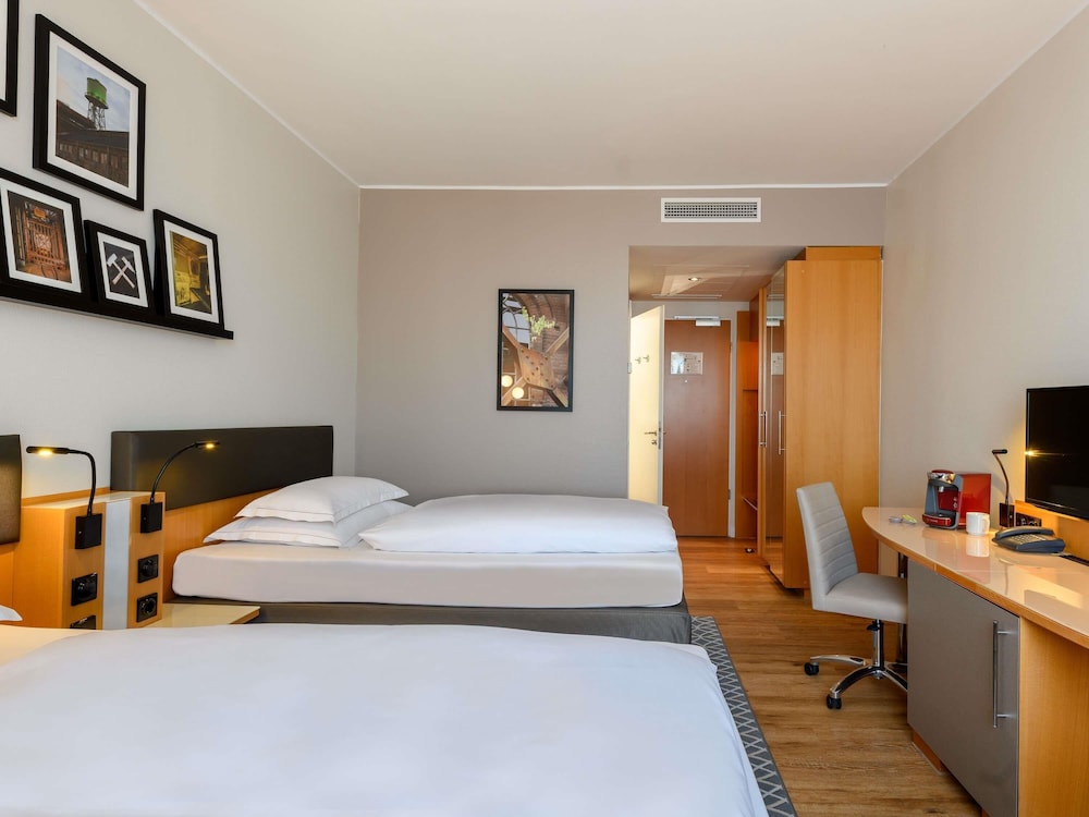 Habitación Superior Matrimonial con 2 Camas Individuales del hotel Mercure Bochum City. Foto 1