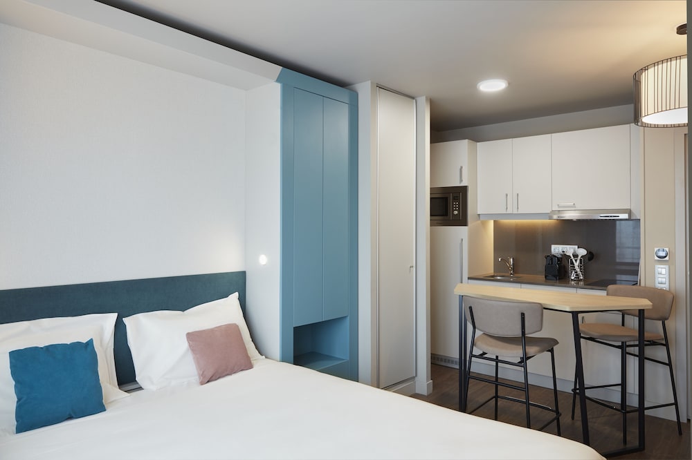 Estudio con camas individuales del hotel Aparthotel Adagio Paris Suresnes Longchamp. Foto 1