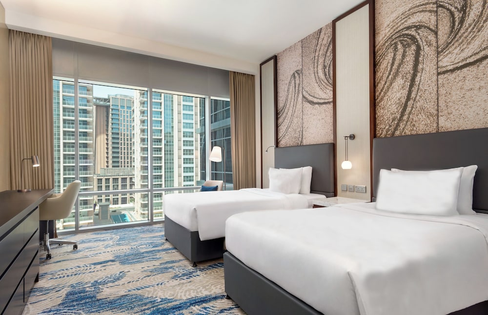 Habitación Deluxe con 2 camas individuales, vistas al parque del hotel Novotel Dubai Gold District