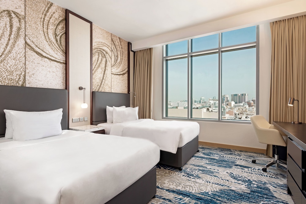 Habitación ejecutiva con 2 camas individuales del hotel Novotel Dubai Gold District