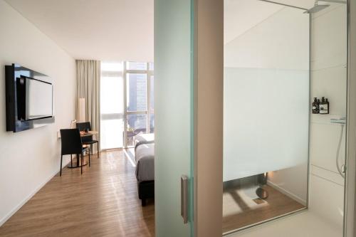 Habitación Innside con vistas a la ciudad del hotel Innside By Meliá Milano Torre Galfa. Foto 4