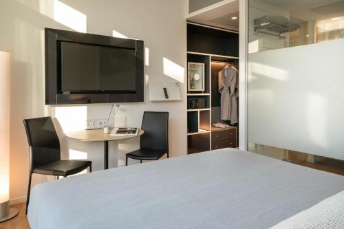 Habitación Innside Comunicada del hotel Innside By Meliá Milano Torre Galfa. Foto 1