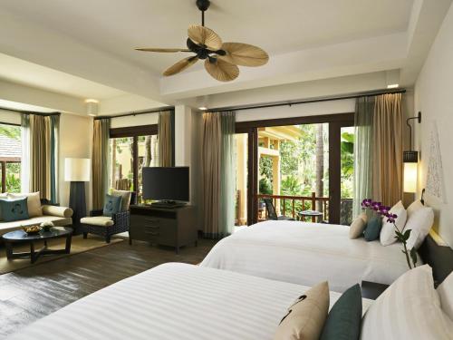 Suite Junior con vistas a la piscina - 2 camas del hotel Mövenpick Asara Resort and Spa Hua Hin