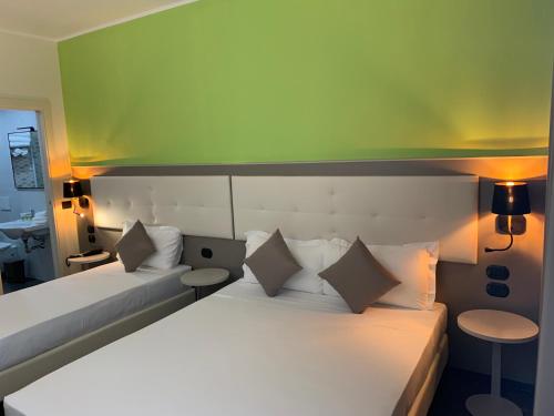 Habitación Triple Deluxe del hotel Stradivari