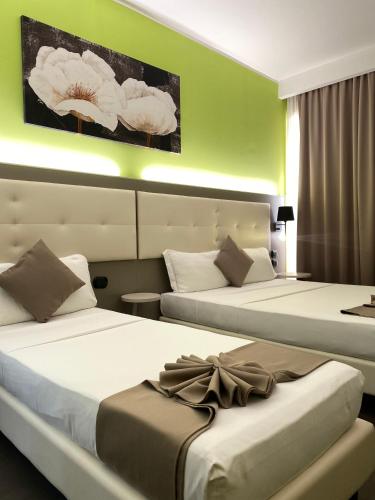 Habitación Triple Deluxe del hotel Stradivari. Foto 5