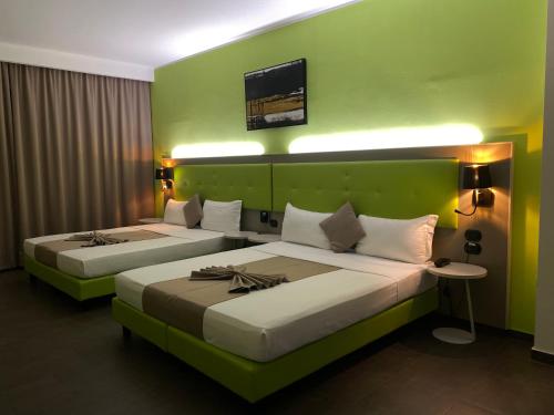 Habitación Cuádruple Confort del hotel Stradivari. Foto 8