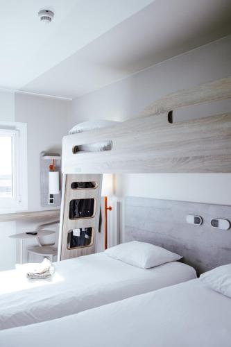 Habitación Doble Estándar - 2 camas del hotel ibis budget Luxembourg Aéroport. Foto 4