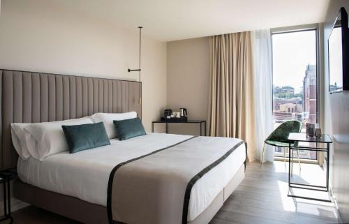 Habitación Deluxe del hotel Occidental Barcelona 1929