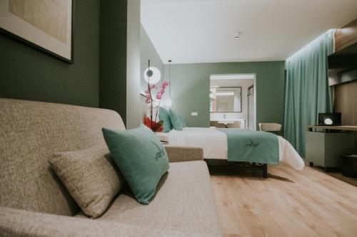 Habitación triple Sofá Cama incluido 2 Camas individuales del hotel Catalina Plaza