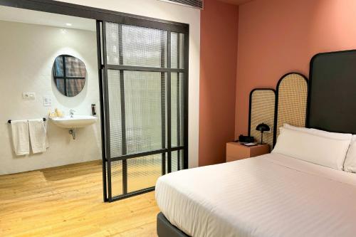 Habitación Doble Económica del hotel Boutique Cordial La Niña de Vegueta. Foto 3