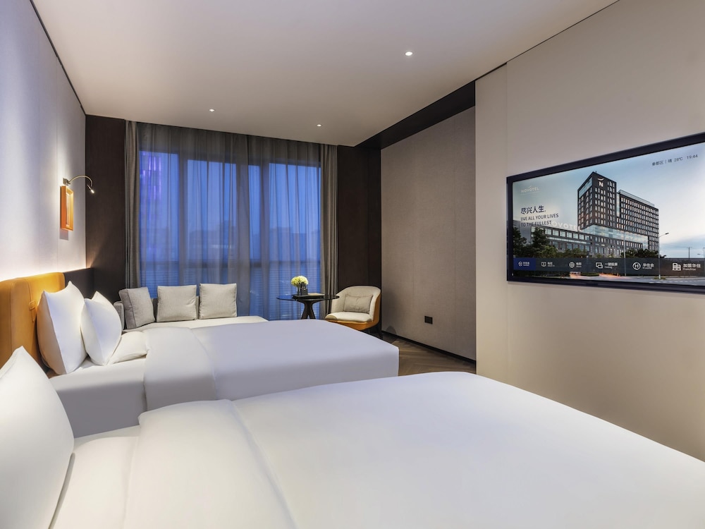 Habitación doble superior, 2 camas individuales del hotel Novotel Xian Xixian. Foto 3