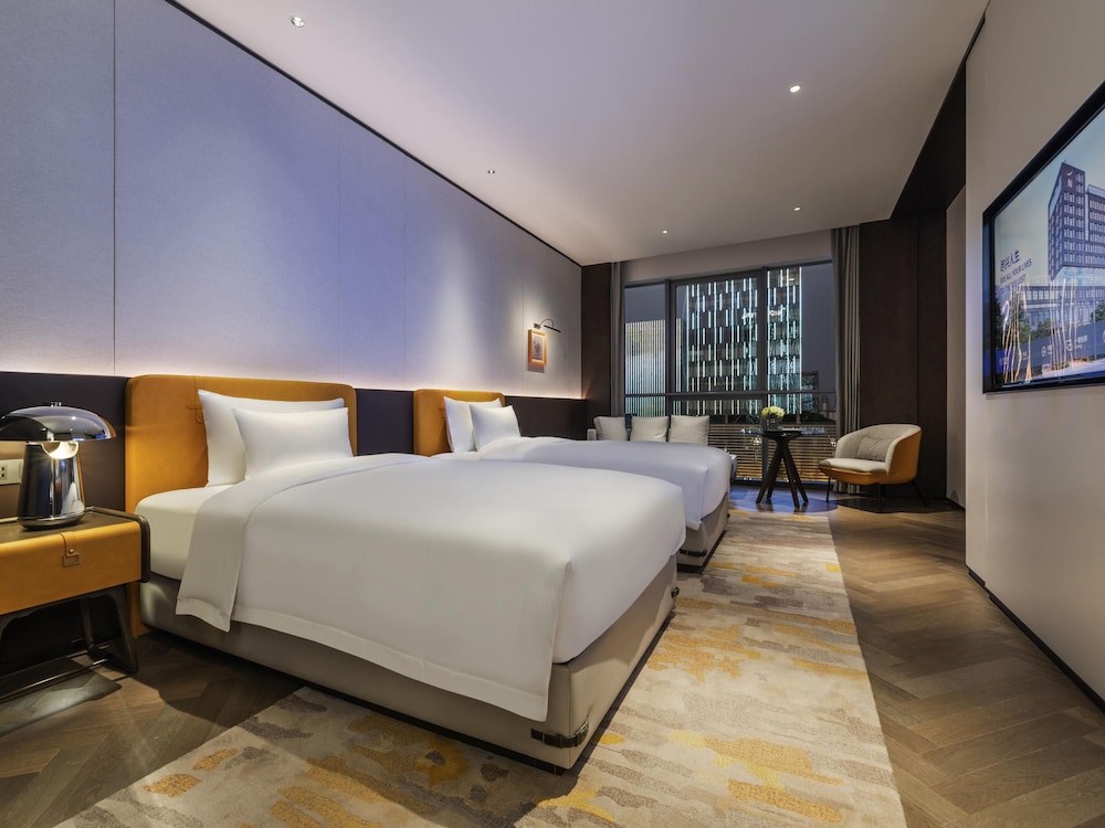 Habitación doble superior, 2 camas individuales del hotel Novotel Xian Xixian. Foto 4