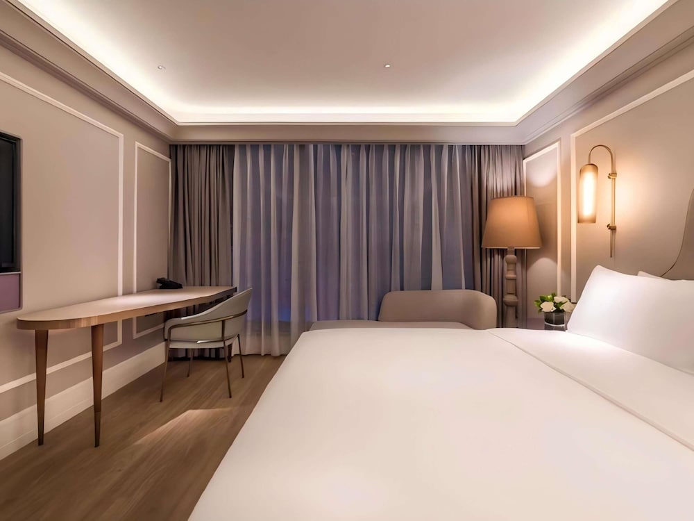 Habitación superior, 1 cama de matrimonio grande del hotel Mercure Wuhan Yangluo