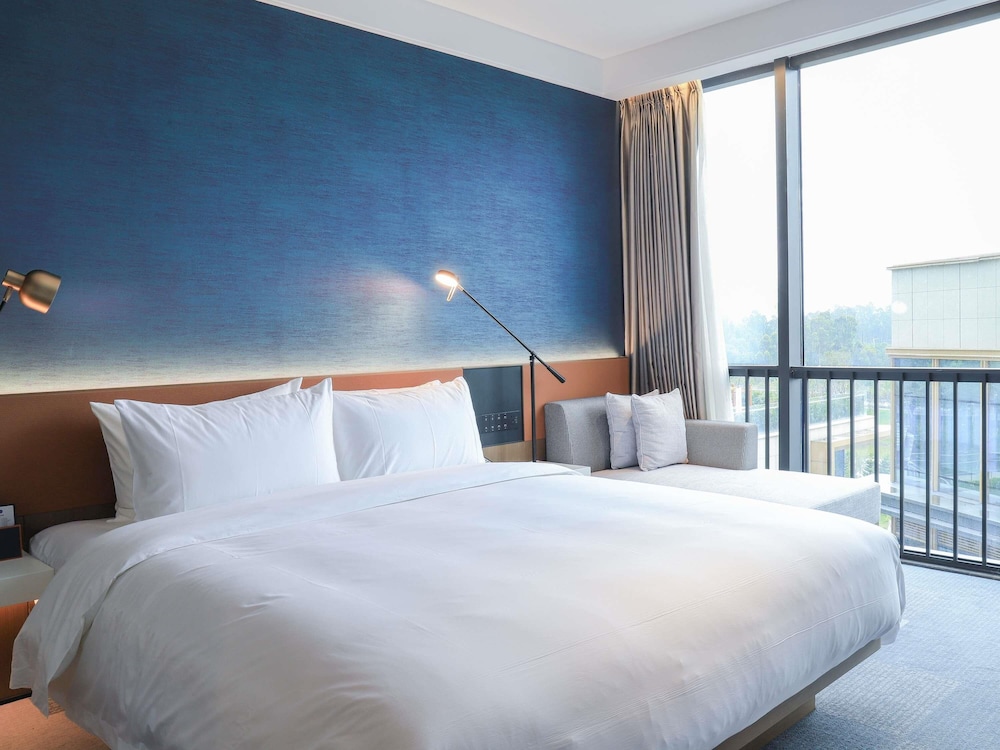 Habitación estándar, 1 cama de matrimonio grande del hotel Novotel Dongguan Songshan Lake. Foto 4