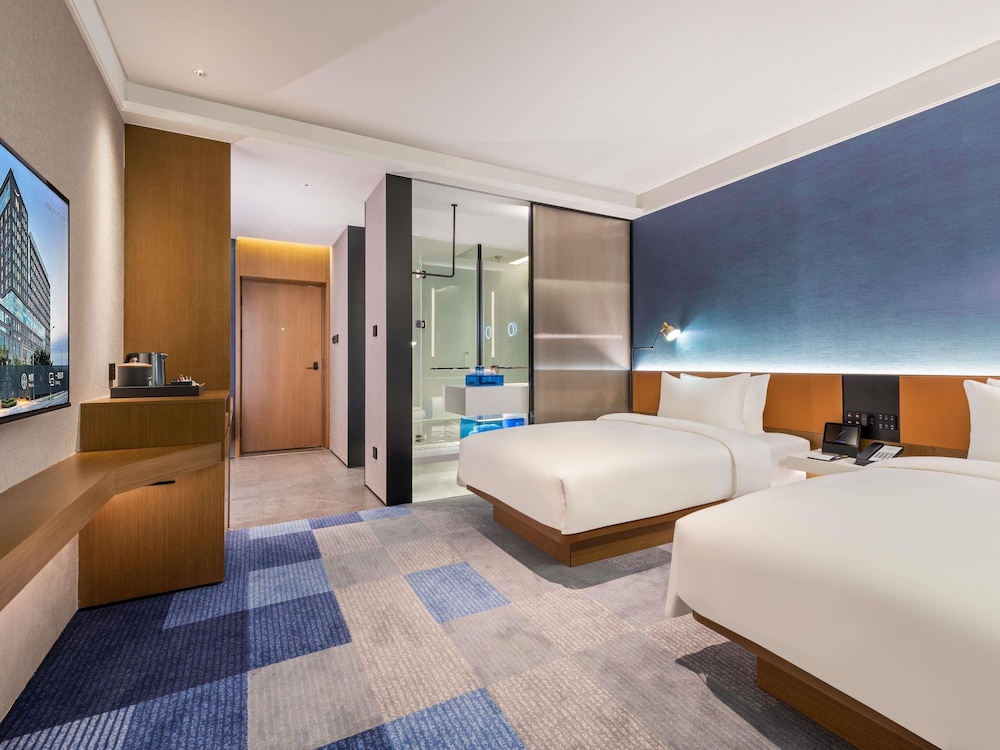 Habitación estándar, 2 camas individuales del hotel Novotel Dongguan Songshan Lake. Foto 1