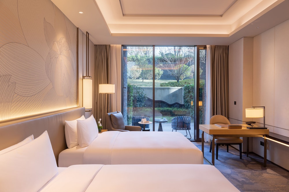 Premium Room with Garden del hotel Gran Melia Chengdu. Foto 4