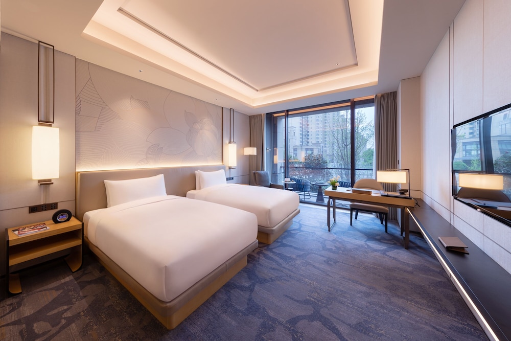 Red Level Room with Balcony del hotel Gran Melia Chengdu. Foto 2