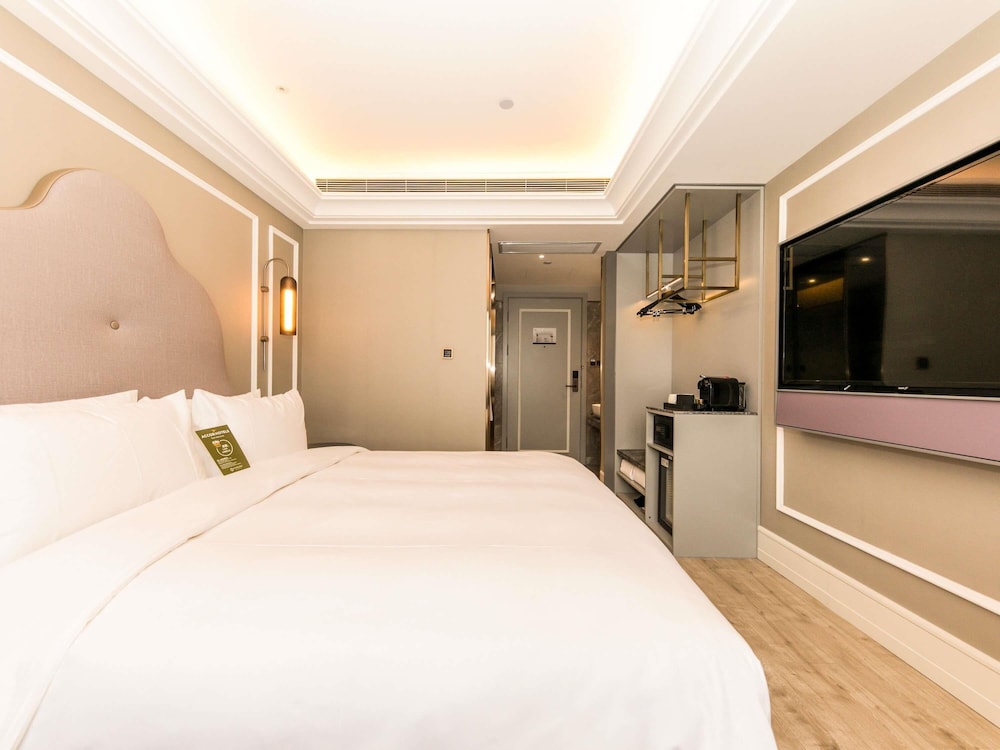 Habitación de Lujo, 1 cama king size del hotel Mercure Xian City Centre. Foto 1