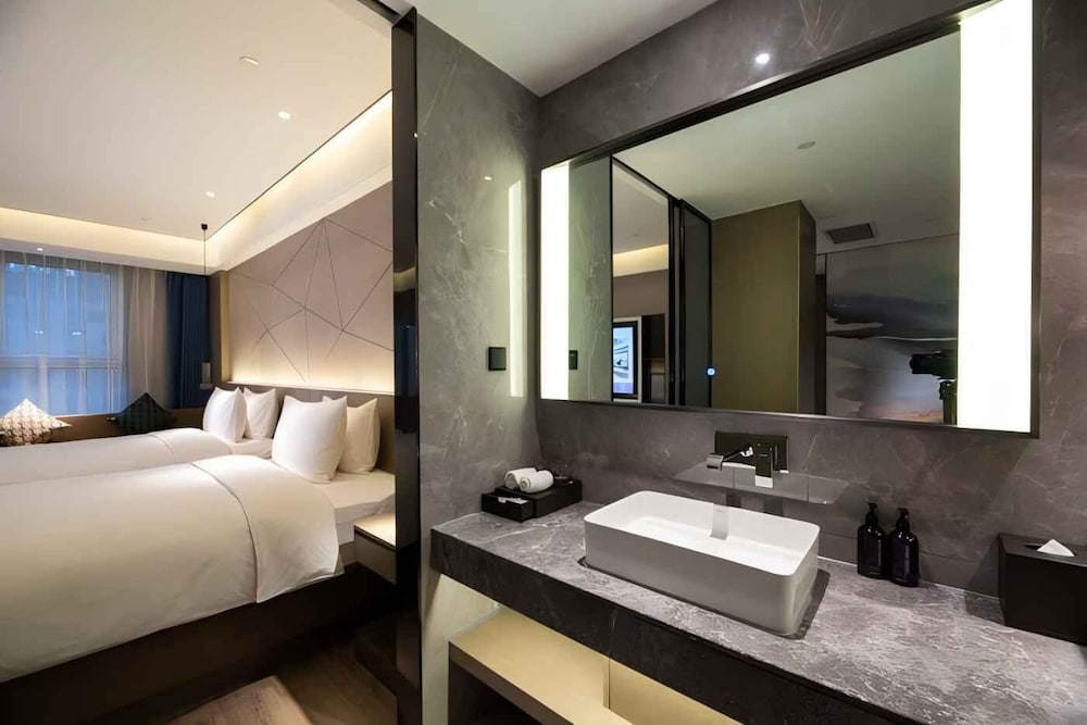 Habitación Deluxe, 1 cama de matrimonio grande del hotel Mercure Xining Haihu CBD. Foto 12
