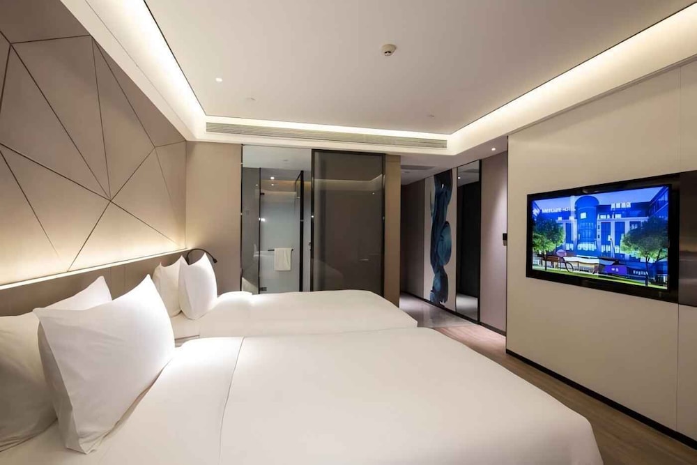 Privilege, Habitación, 1 cama de matrimonio grande del hotel Mercure Xining Haihu CBD. Foto 7