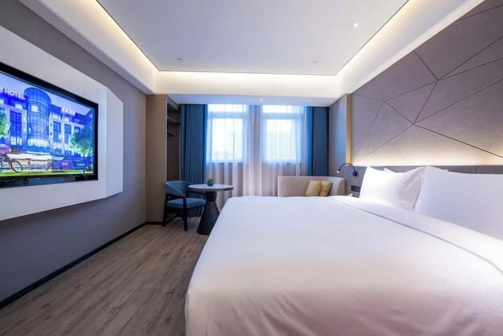 Habitación superior, 1 cama de matrimonio grande del hotel Mercure Xining Haihu CBD. Foto 5