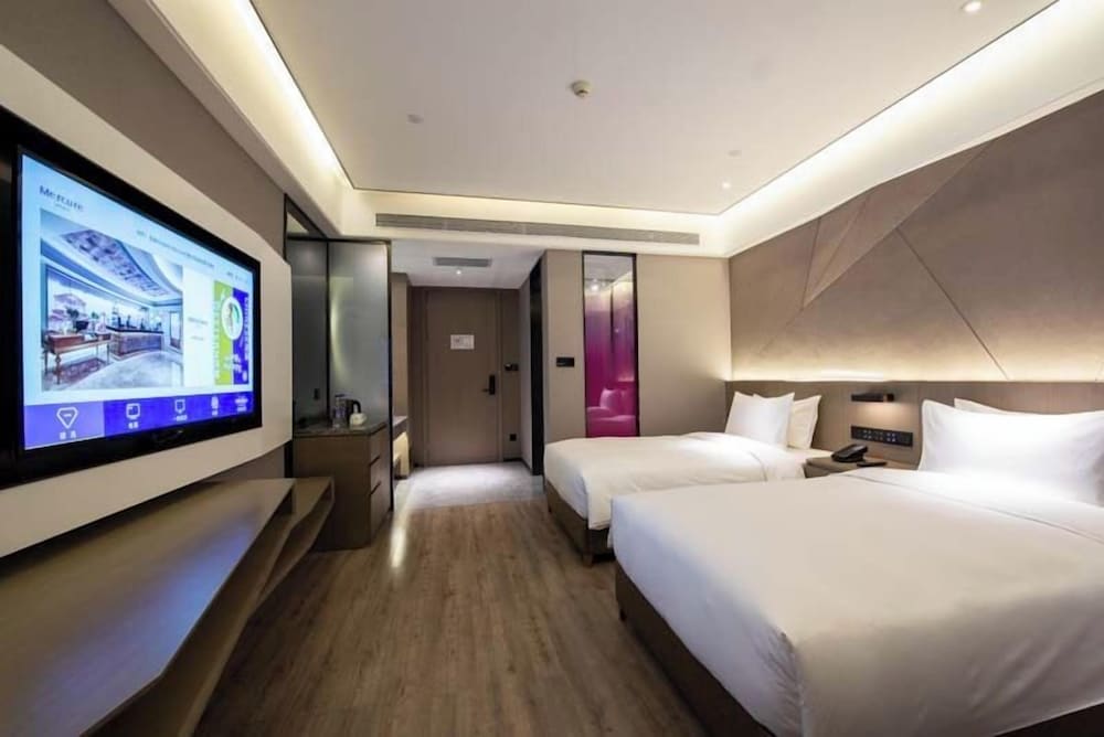 Habitación superior, 2 camas individuales del hotel Mercure Xining Haihu CBD. Foto 9