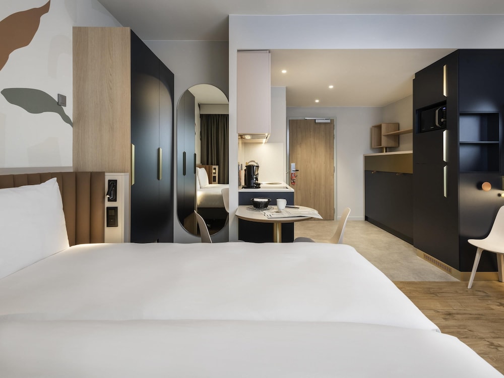 Estudio elegante para 4 huéspedes con 1 cama doble y 2 camas individuales o 4 camas individuales del hotel Adagio Access Brussels Delta. Foto 2