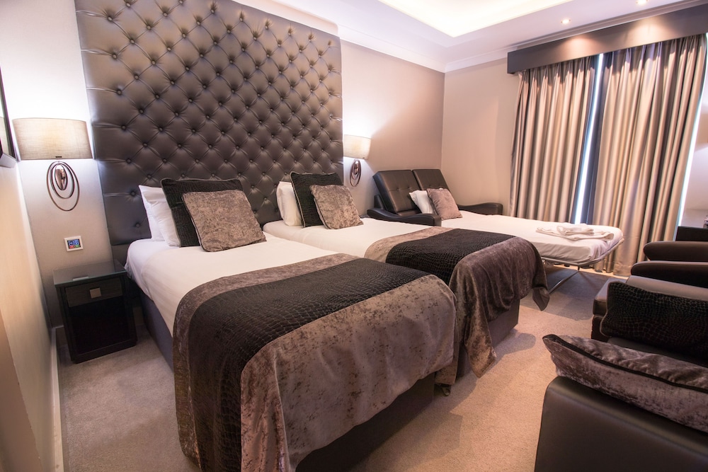 Habitación ejecutiva con 2 camas individuales del hotel The Continental Heathrow. Foto 7