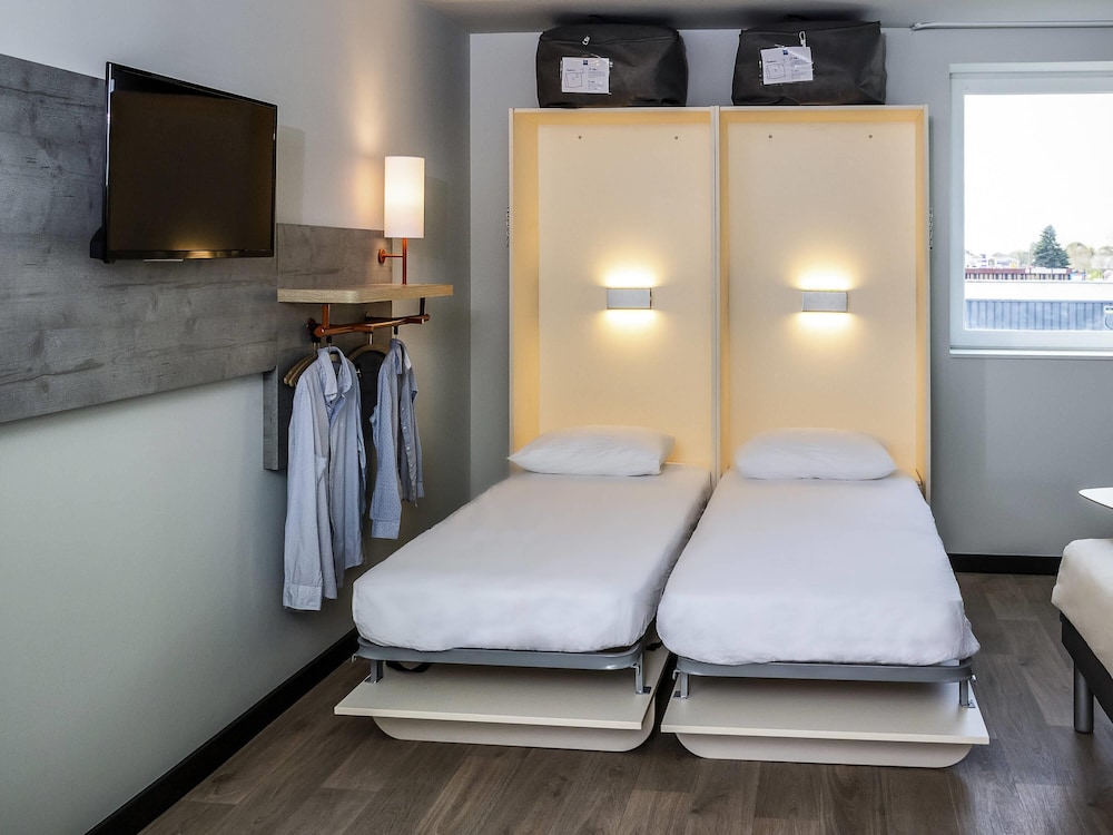 Habitación Familiar del hotel Ibis Budget Cognac. Foto 3