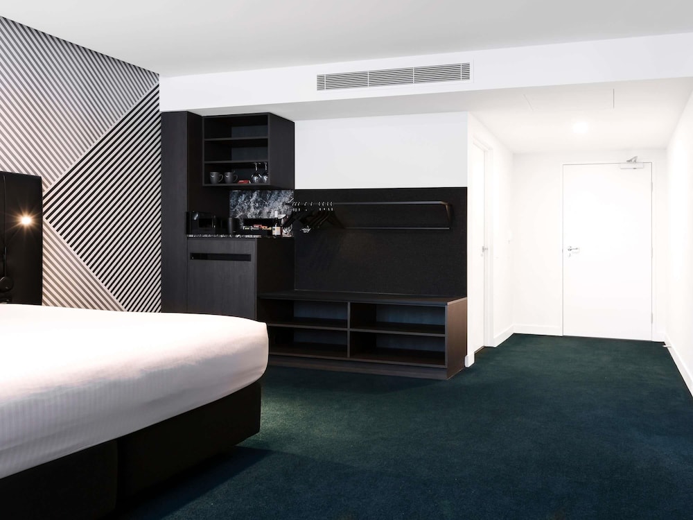Habitación Superior Accesible con 1 cama King del hotel Mövenpick Melbourne On Spencer. Foto 4