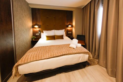 Habitación Doble del hotel Hercules Boutique. Foto 1