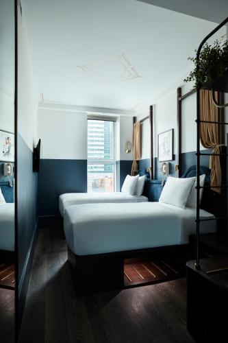 Habitación Doble - 2 camas del hotel Civilian. Foto 11