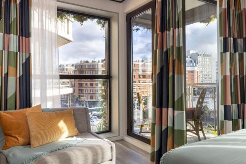 Habitación Deluxe con balcón del hotel La Belle Ville. Foto 7