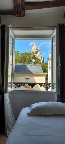 Habitación Doble con vistas del hotel Le Village Montmartre by Hiphophostels